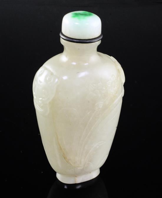 A Chinese pale celadon jade snuff bottle, 1800-1900, 6.7cm excluding jadeite stopper